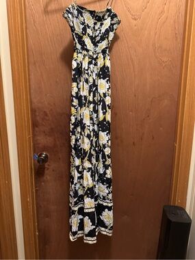 Free People, Floral Smocked Maxi Jumpsuit in Black and Yellow! So cute